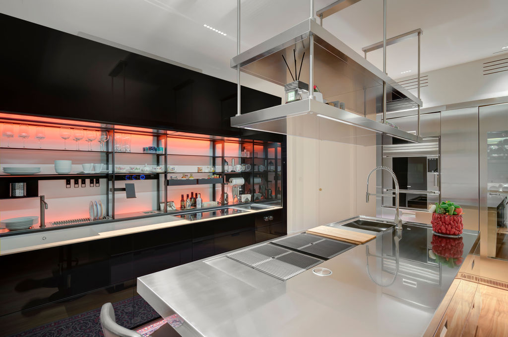 arredamento classico contemporaneo cucina logica celata valcucine aperta e isola arclinea