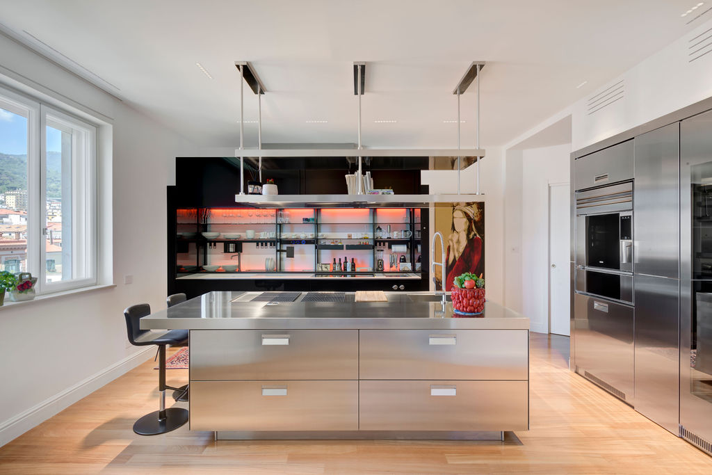 arredamento classico contemporaneo cucina logica celata valcucine aperta e isola arclinea